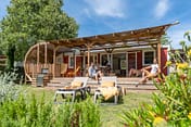 La Plage Fleurie campsite - Accommodation - Couples on the Sirius Premium Cottage terrace