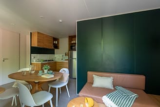 Camping Arc en Ciel - Rentals - Ma&eacute; Cottage - Living Room and Kitchen