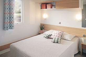 Camping La Plage Fleurie - Accomodaties - Cottage Gili - 4 personen - 2 slaapkamers - Aangepast aan gehandicapten - Master Suite