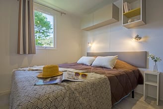 Camping La Plage Fleurie - Accomodaties - Cottage Bali - 4 personen - 2 slaapkamers - Master Suite