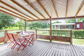 Camping La Plage Fleurie - Accomodaties - Cottage Alizé - 4 personen - 2 slaapkamers - Terras