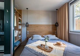 Camping les Tournels : Cottage Calypso - Chambre à lit double