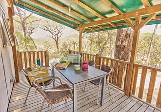 Camping les Tournels : Cottage Safari - Terrasse