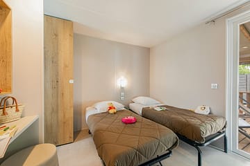 Camping Arc en Ciel - Locations - Cottage Calys - Chambre enfant