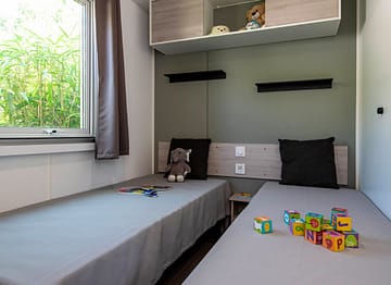 Camping la Sir&egrave;ne - H&eacute;bergements - Sir&egrave;ne 2 - 4 personnes - 2 chambres - Chambre enfants